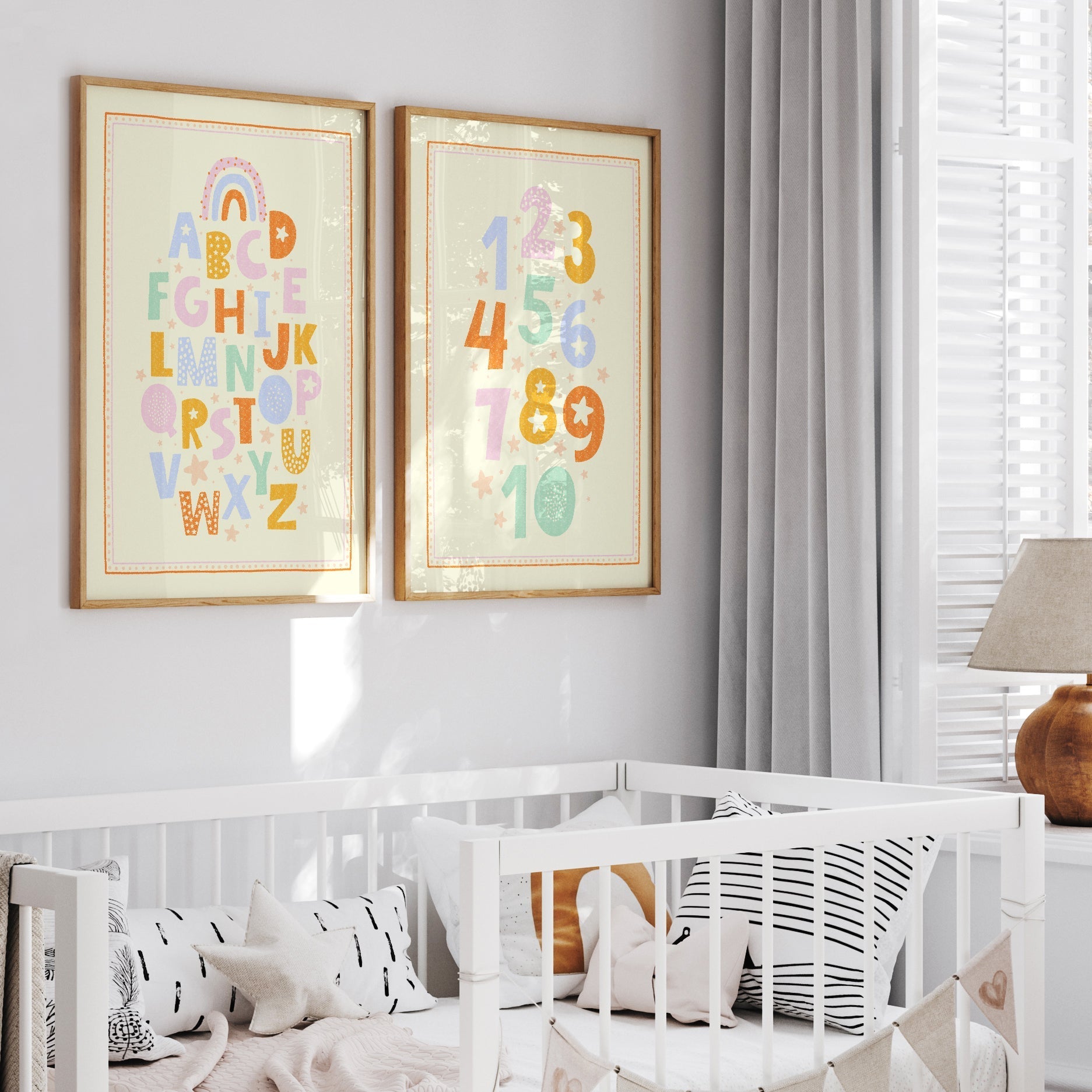 Set of the Boho Alphabet Print and Boho Numbers Print Framed hanging on a wall in a well lit childs bedroom